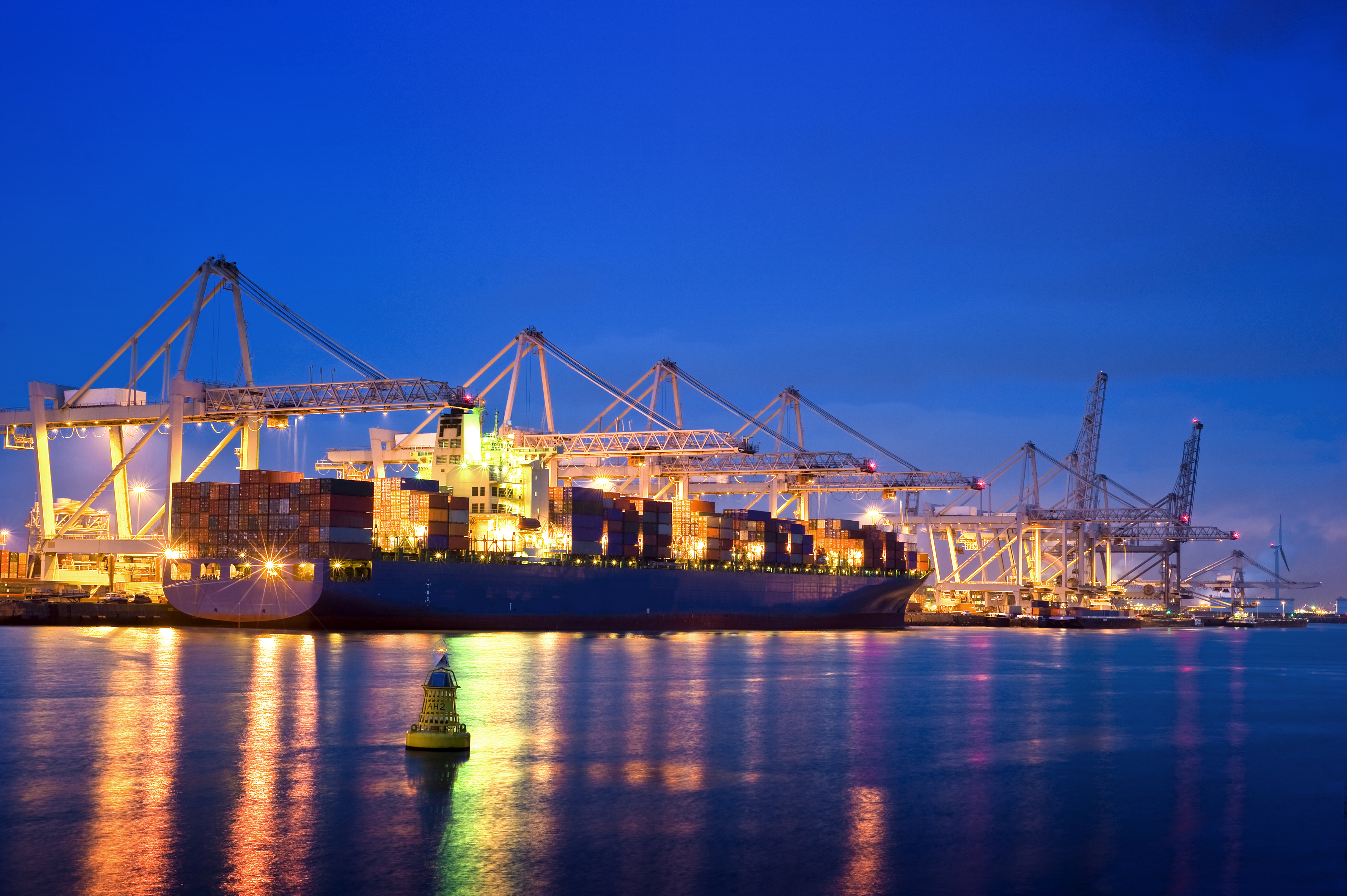 Container-terminal-night-Harbor-Shipping